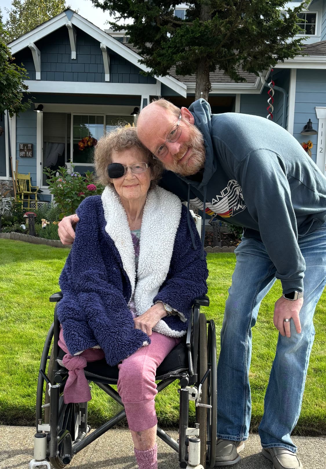 Brian Bresser with his mother outside a Treasure Valley home
