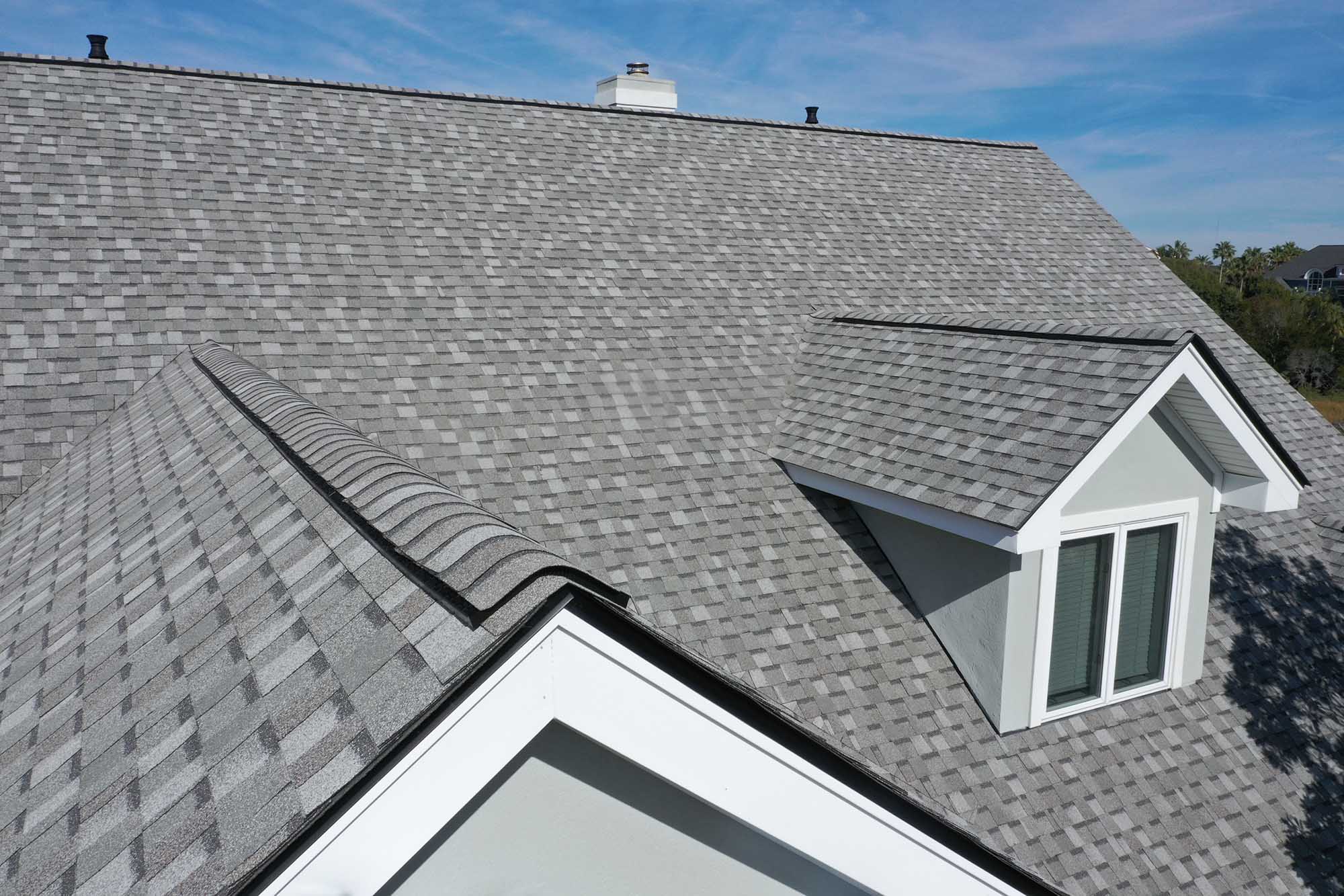 New architectural shingle roof on a family home
