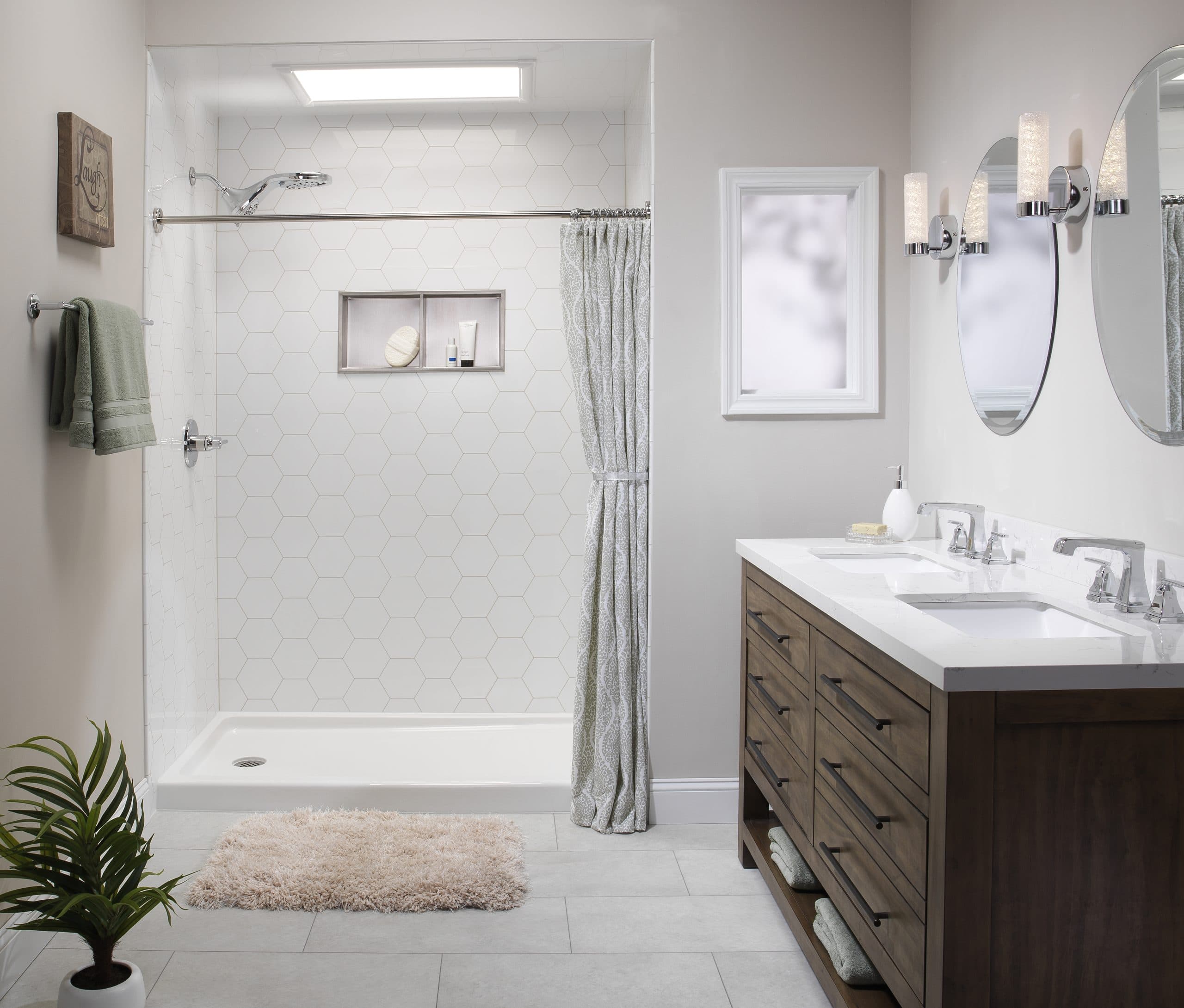 Walk-in shower remodel with hexagon tile and double vanity