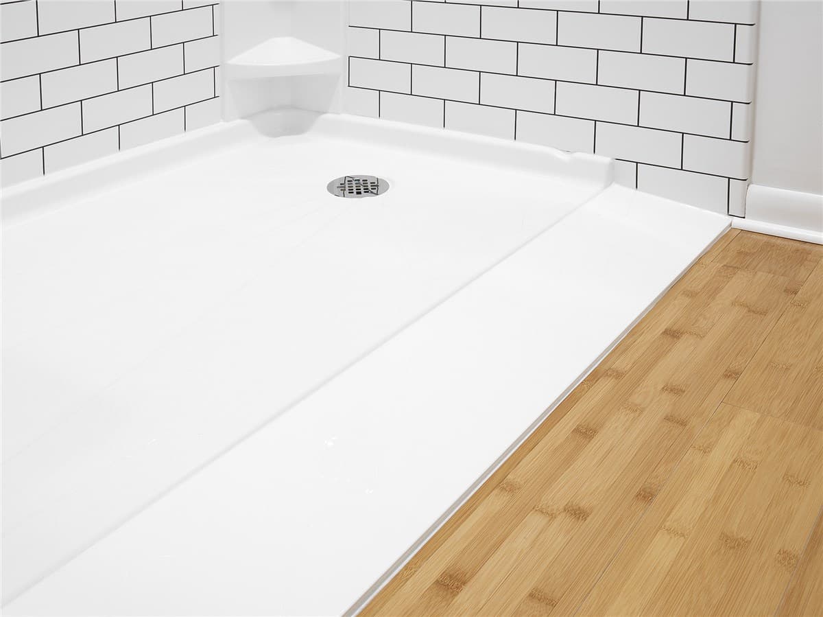 Barrier-free roll-in shower with grab bars and seat